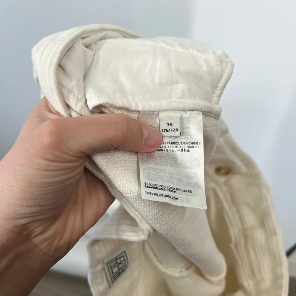 Toteme Pleated Silk and Organic Cotton-Blend Corduroy Wide-Leg Pants in Ecru - Picture 8 of 11